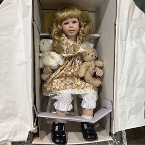 Blonde Porcelain Doll with Floral Dress and Teddy Bears